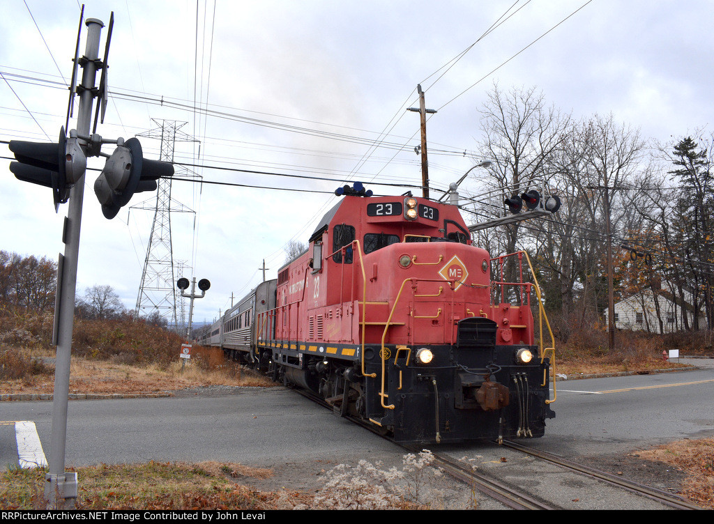 On 11/23/24, GP7u # 23 leading the first trip of the day across Deforest Avenue in East Hanover 